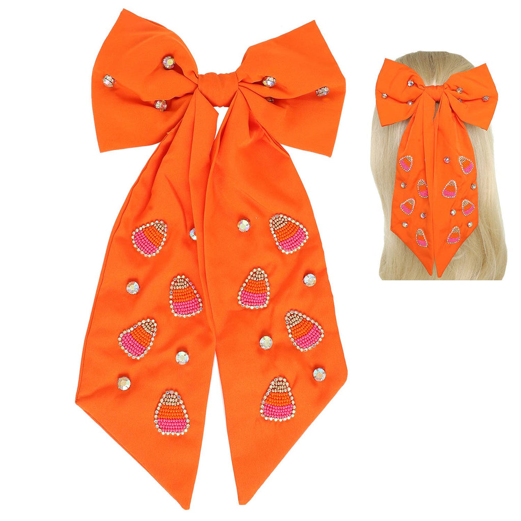 Orange bow with candy corn designs